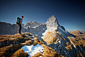 women  on the ridge of Schafjoechl, Lamsenspitze in the back,  Eastern Karwendel Range, Tyrol, Austria