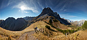 Two Hikers on the path to Sonnjoch, Lamsenspitze in the back,  Eastern Karwendel Range, Tyrol, Austria