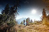 Two Hikers on the way to the top of Daniel Mountain, Daniel mountain, Ammergau Alps, Tyrol, Austria