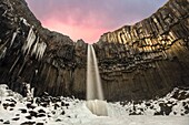 Svartifoss waterfall at sunset, Skaftafell National Park, Southern Iceland.