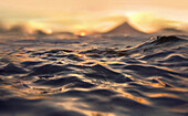 Ocean waves, sunset and Mayon Volcano , Legazpi City, Luzon Island, Philippines -Asia