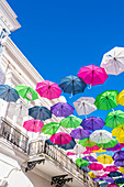 Umbrellas as a tourist attraction in Calle Fortaleza, Old Town, San Juan, Puerto Rico, Caribbean, USA