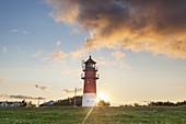 Lighthouse with sunrise in Büsum, Dithmarschen, Schleswig-Holstein, Northern Germany, Germany, Europe