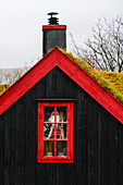 Details of window and facade of wood house with turf roof, Torshavn, Streymoy island, Faroe Islands, Denmark