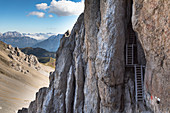 the stairs built into the rocks from the soldiers during the World War One, along the via ferrata Bepi Zac in the Marmolada Group, Trento Province, Trentino Alto Adige, Italy