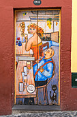 Painted doors in Santa Maria street for the Art of Open Doors project. Funchal, Madeira region, Portugal.