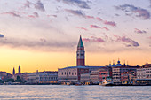 St. Mark's Campanile and Doge's Palace at sunset from Riva San Biasio at sunset, Venice, Veneto, Italy.