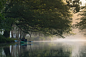 During the sunrise, the countless rivers of the Spreewald transform into a fairytale landscape