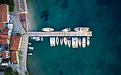 Sailboats in buoy field in front of Susak island, Kvarner bay, Adriatic sea, Croatia