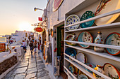 Shops selling souvenirs at Oia at sunset, Santorini, Cyclades, Aegean Islands, Greek Islands, Greece, Europe
