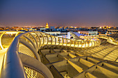Illuminated spiral curved walkways on rooftop of the Metropol Parasol, Plaza de la Encarnacion, Seville, Andalusia, Spain, Europe