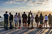 Tourists on top of Sugar Loaf Mountain in Rio de Janeiro, Brazil