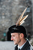 Adult man wearing traditional Glengarry bonnet, Scotland, UK