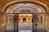 Wrought-iron gate to the courtyard of the town hall of Aix en Provence, France