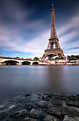 View on the Eiffel Tower and the Pont d'IÃ © na from the opposite bank side of the Seine, long exposure, Paris, ÃŽle-de-france, France
