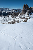 The Cinque Torri from Rifugio Nuvolau with views of the Dolomites and in the foreground a heart, Cortina d'Ampezzo; Belluna; Italy