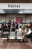 Bavarian folk band plays in the subway on the way to the Oktoberfest, Munich, Bavaria, Germany