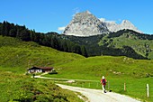Hiking under the eastern Wilden Kaiser over Kirchdorf, Tirol, Austria