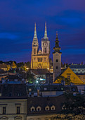 Cathedral spires over rooftops in cityscape, Zagreb, Zagreb, Croatia
