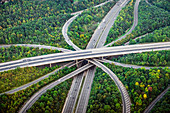 Aerial view of intersecting highways near trees, London, England