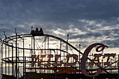 Silhouette of wild cat rollercoaster at Puyallup Fair, Puyallup, Washington, United States
