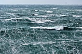 France, Finistere, Iroise Sea, Parc Naturel Regional d'Armorique (Armorica Regional Natural Park), Ile du Ponant, Ile d'Ouessant, Rough sea in le passage du Fromveur during storm Ruth, February 8th 2014 (aerial view)