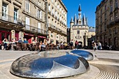 France, Gironde, Bordeaux, area listed World Heritage by UNESCO, fountain architect Emmanuelle Lesgourgues on Place du Palais, Porte Cailhau