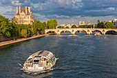 France, Paris, area listed as World Heritage by UNESCO, a shuttle boat to the pont du Carrousel