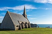 France, Seine Maritime, Pays de Caux, Alabaster Coast, Etretat, Notre Dame de la Garde chapel, protector of the fishermen, perched on Amont cliff and Aval cliff in the background