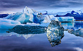 Icebergs in the Jokulsarlon glacier lagoon at blue hour, Iceland