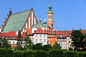 Old town view from the bank of the river Vistula. On the left roof of Warsawâ€™s cathedral, on the right tower of the church of the Jesuits, the shrine of Our Lady of the loving, Warsaw, Mazovia region, Poland, Europe