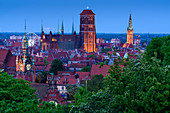 View from the Gradowa hill towards medieval old town. On the left main railway station, in the middle basilica of St. Mary of the Assumption of the Blessed Virgin Mary in Gdansk, commonly known as Mariacki church, and thin tower of City Hall. Gdansk, Main City, Pomorze region, Pomorskie voivodeship, Poland, Europe