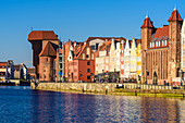 Gdansk, Main City, old town, old motlawa canal. Gothic crane, branch of the National Martime Museum, on the right Straganiarska gate. Gdansk, Main City, Pomorze region, Pomorskie voivodeship, Poland, Europe