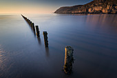 Groynes, Brean Beach, with Brean Down in far distance, Somerset, England, United Kingdom, Europe