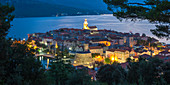 View over the Old Town at dusk, the illuminated cathedral prominent, Korcula Town, Korcula, Dubrovnik-Neretva, Dalmatia, Croatia, Europe