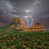 Lightning striking in between Courthouse Butte and Bell Rock near Sedona, Arizona, United States of America, North America