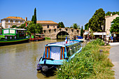 Boats in Le Somail on the Canal du Midi, Occitania, France