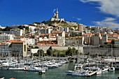 France, Bouches du Rhone, Marseille, vieux port of Marseille and the basilica Notre Dame de la Garde