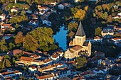 France, Vendee, Mareuil sur Lay Dissais, the church and the village on the Lay river (aerial view)