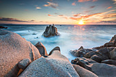 The light of sunset on blue sea framed by cliffs, Capo Testa, Santa Teresa di Gallura, Province of Sassari, Sardinia, Italy, Mediterranean, Europe