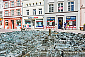 Marktplatz (market place square) in the centrum of Wismar, brass model of old town. Wismar stadt, Mecklenburg–Vorpommern, Germany.