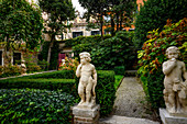 Garden with putti in Venice, Italy