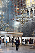 Tourists in Hagia Sophia with scaffolding in Istanbul, Turkey