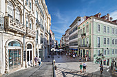Shopping street with people in Coimbra, Portugal