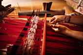 Girl weaving using traditional method, Sidemen, Bali, Indonesia, Southeast Asia, Asia