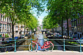 Bicycle on a bridge, Leidsegracht canal, Amsterdam, North Holland, The Netherlands, Europe