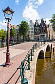 Old gabled buildings and bridge over Keisersgracht Canal, Amsterdam, North Holland, The Netherlands, Europe