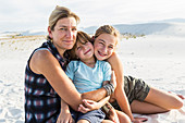 portrait of mother and her children, White Sands Nat'l Monument, NM