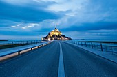 France, Manche, Mont Saint Michel Bay listed as World Heritage by UNESCO, the footbridge by architect Dietmar Feichtinger and Mont Saint Michel
