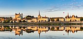 France, Maine et Loire, Loire valley listed as World Heritage by UNESCO, Saumur, the castle, Saint Pierre church and the town hall are reflected in the Loire river